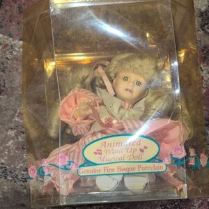 Wind-Up Musical Doll - Pink and White Porcelain Doll